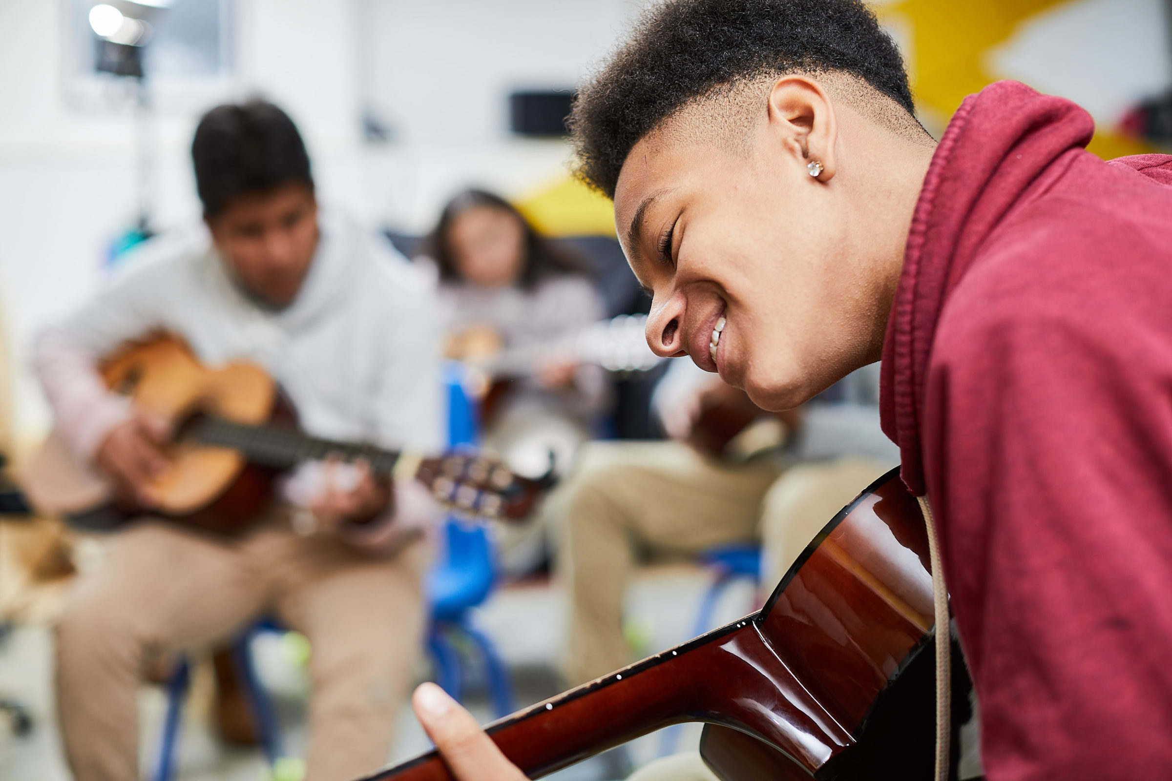 E.L. Haynes' Middle School Student Plays Guitar